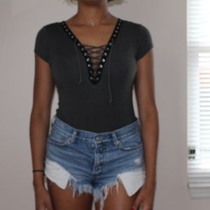 Leotard top with a snap button at the bottom